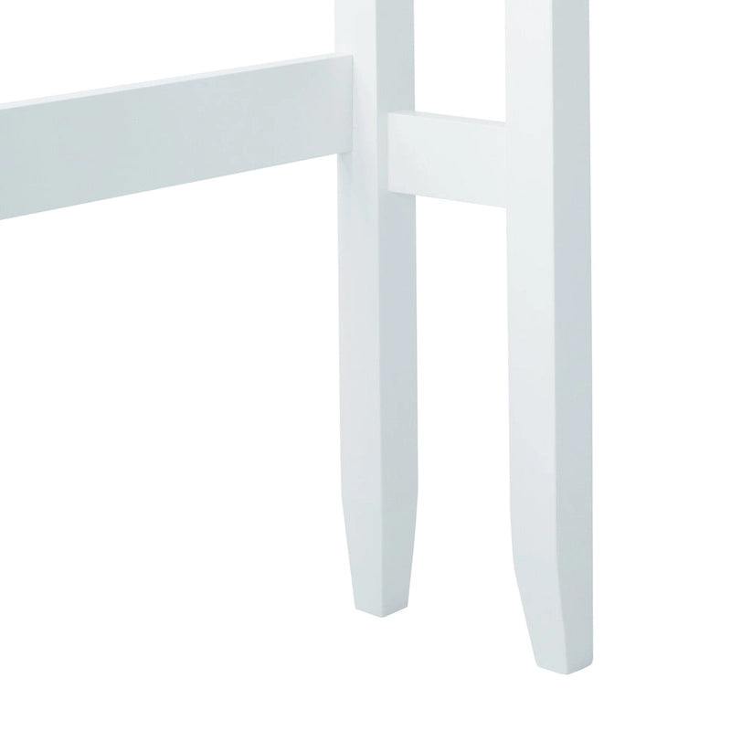 Meuble de rangement blanc à poser au-dessus des toilettes avec porte à panneaux à rainures et languettes et étagères ouvertes