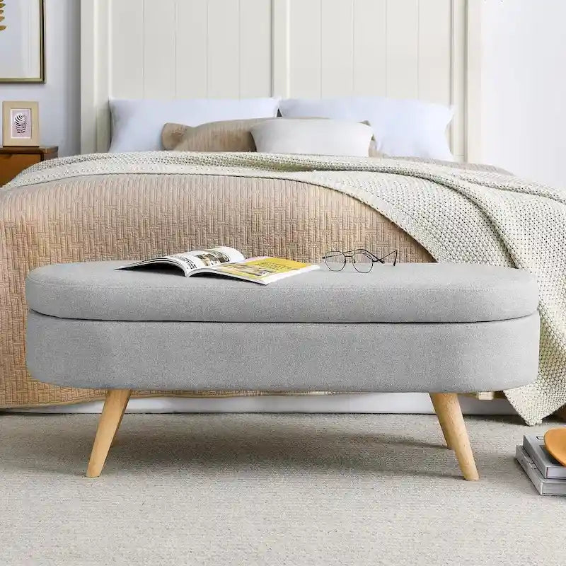 Banc de rangement ottoman ovale en bouclette avec pieds effilés en bois d'hévéa