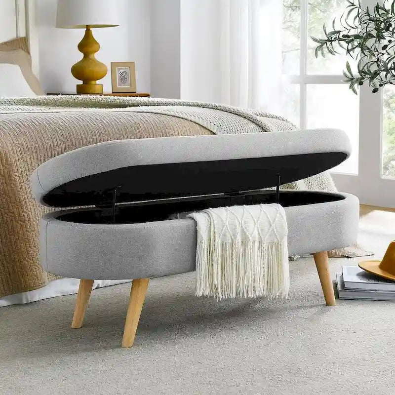 Banc de rangement ottoman ovale en bouclette avec pieds effilés en bois d'hévéa