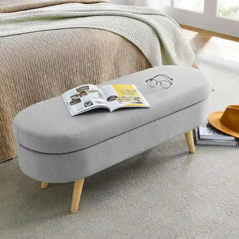 Banc de rangement ottoman ovale en bouclette avec pieds effilés en bois d'hévéa