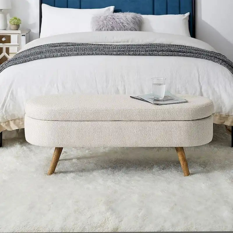 Banc de rangement ottoman ovale en bouclette avec pieds effilés en bois d'hévéa