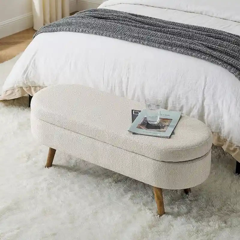 Banc de rangement ottoman ovale en bouclette avec pieds effilés en bois d'hévéa