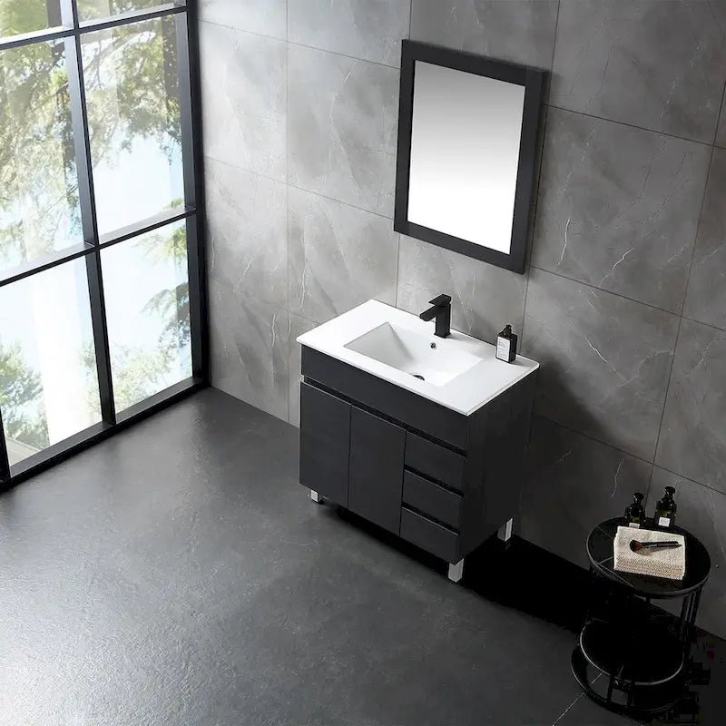 Meuble-lavabo autoportant de 32 po en MDF noir avec lavabo intégré en céramique, une porte et trois tiroirs