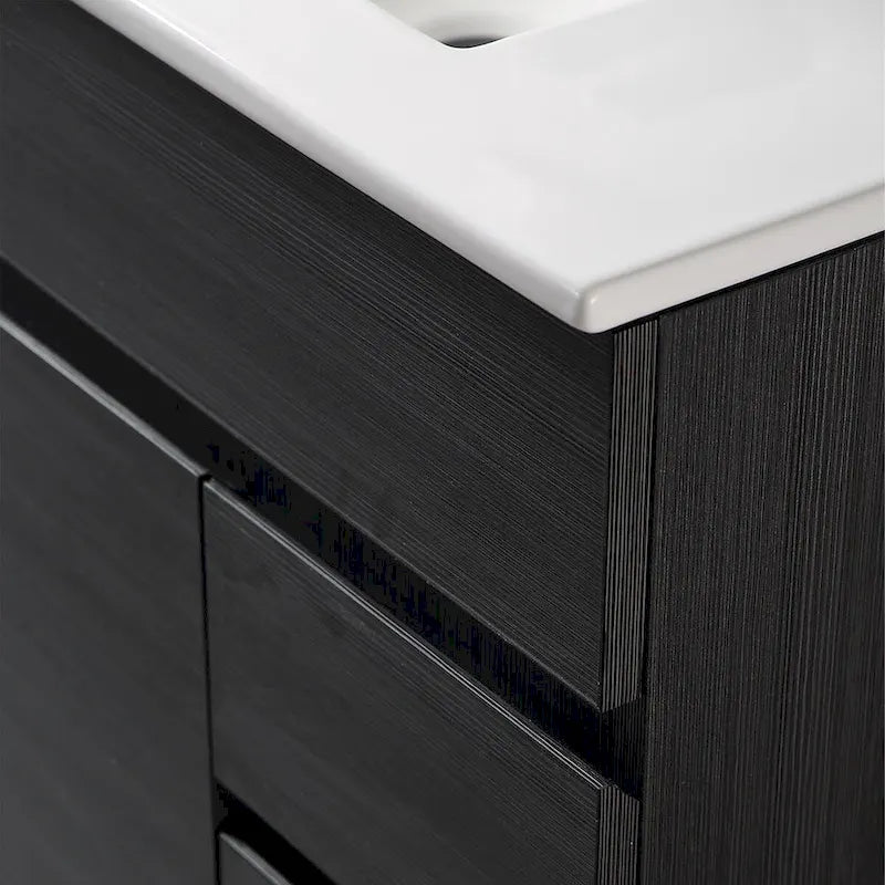 Meuble-lavabo autoportant de 32 po en MDF noir avec lavabo intégré en céramique, une porte et trois tiroirs