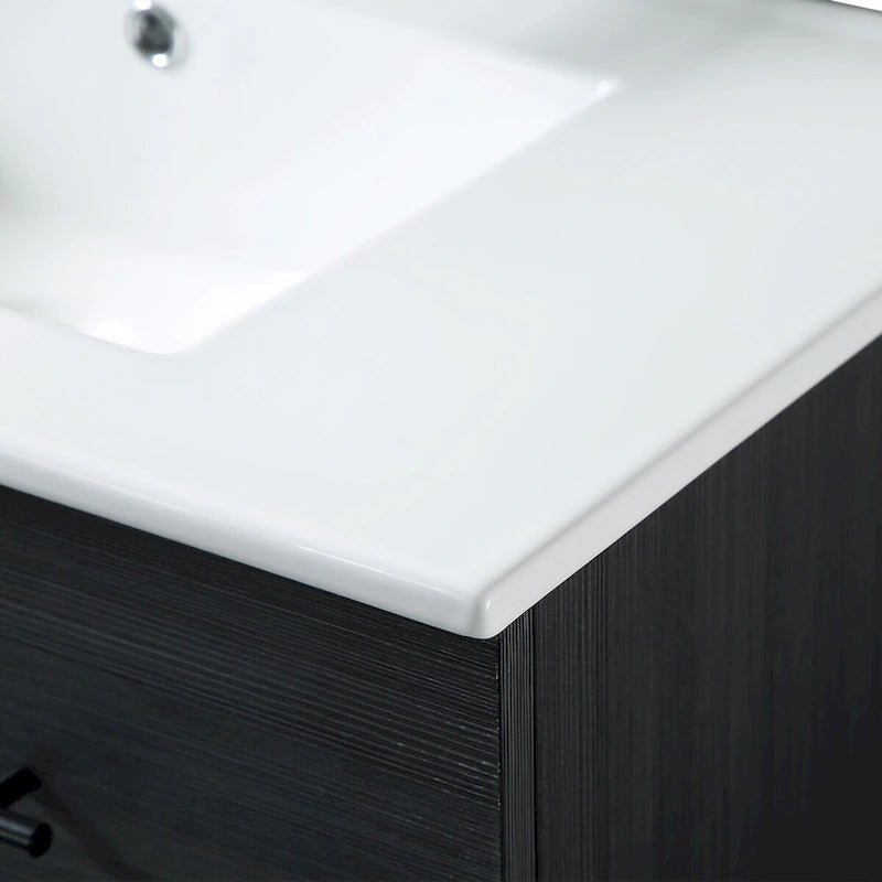 Meuble-lavabo autoportant de 32 po en MDF noir avec lavabo intégré en céramique, une porte et trois tiroirs